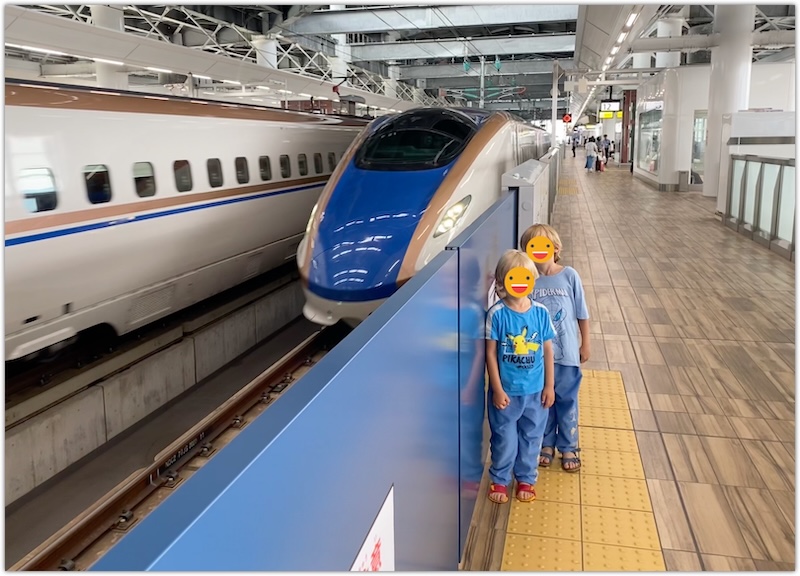 Children at a Japanese bullet train station.